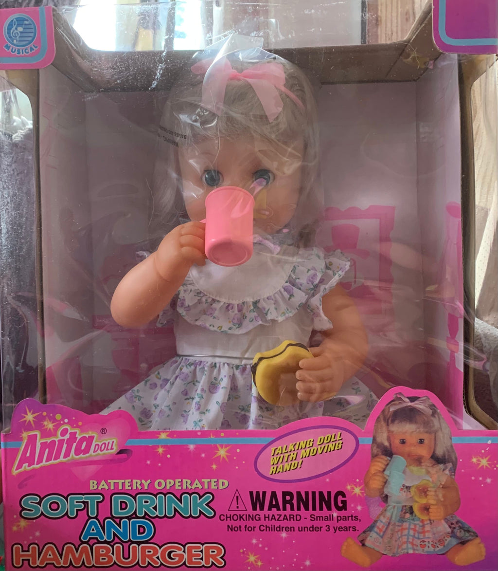 Feeding girl doll