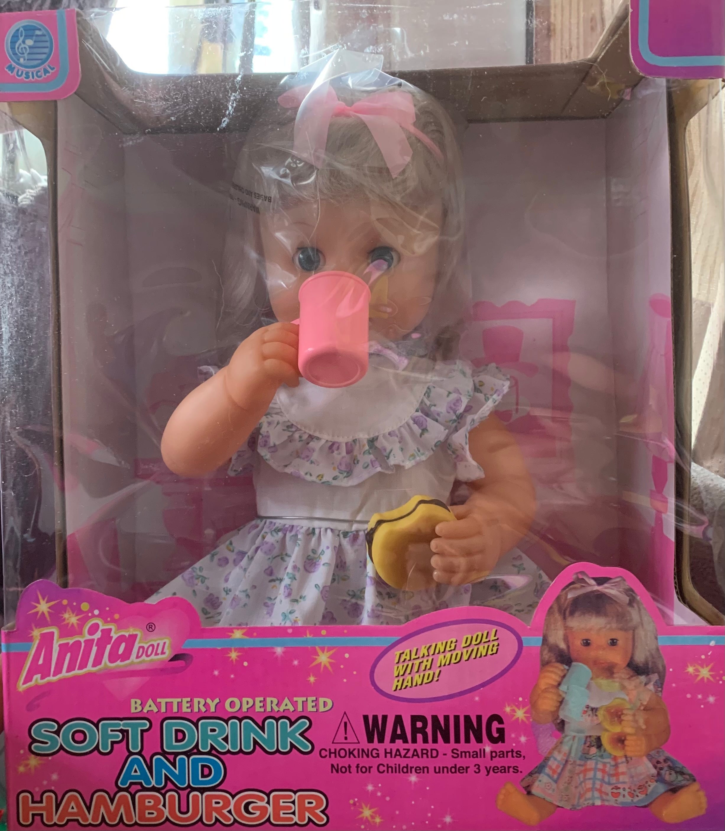Feeding girl doll